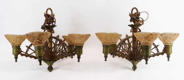 Pair Art Deco cast iron and brass chandeliers with frosted glass shades