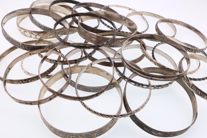 Various Makers; Twenty-Five Sterling Silver Bangle Bracelets