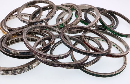 Art Deco Style; Nineteen Silver and Base Metal Rhinestone Bracelets