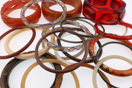 Modernist Jewelry; Large Group of Plastic, Glass and Lucite Bangles