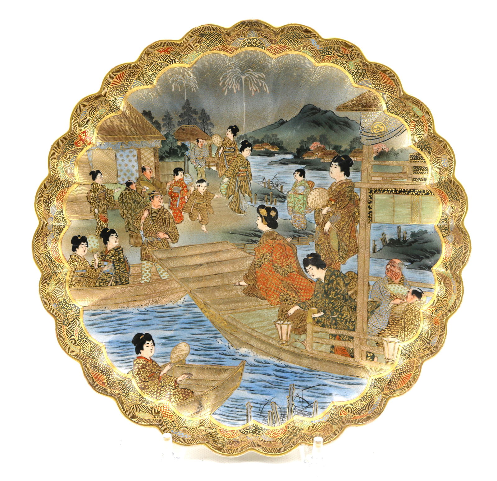 Meiji Era Japanese Satsuma Pottery Scalloped Edge Charger: Diameter 12 3/4 inches. Crazing and minor wear to high spoints, signed verso Gyukosen(?).