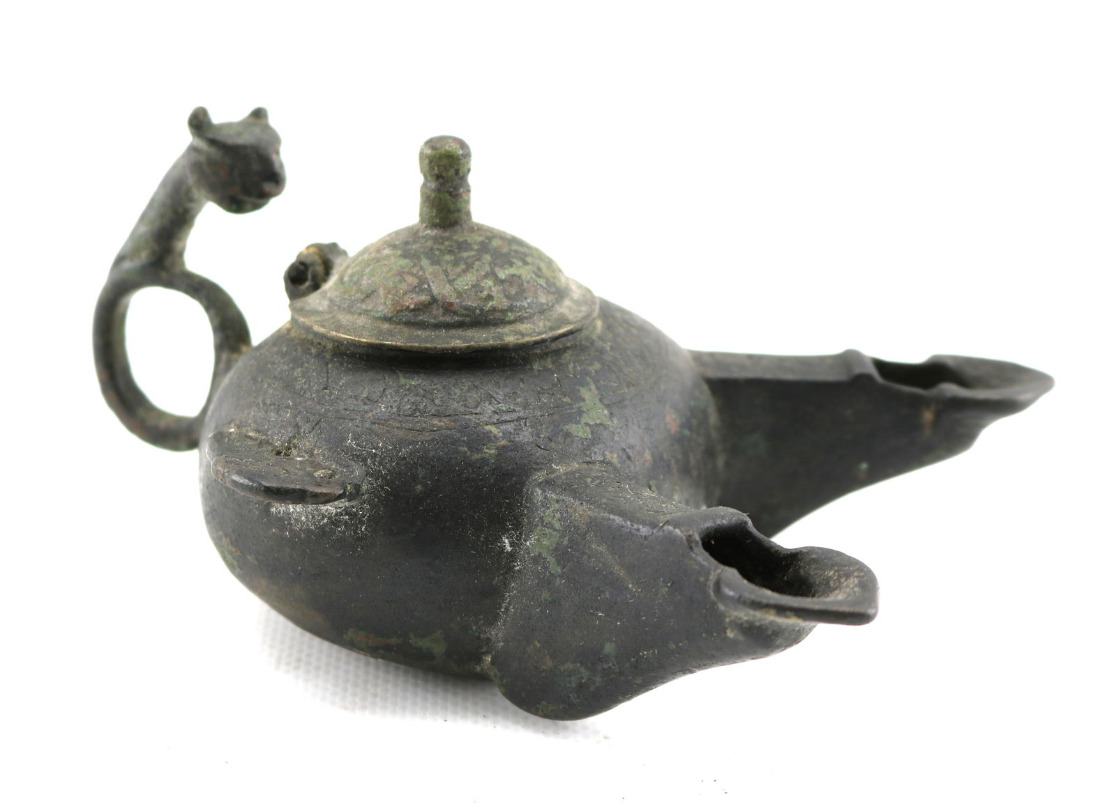 Ancient Roman Bronze Oil Lamp with Figural Theater Mask Handle: See photos for portable XRF analysis. Overall length appx. 5 3/4 inches. Minor losses/damage.