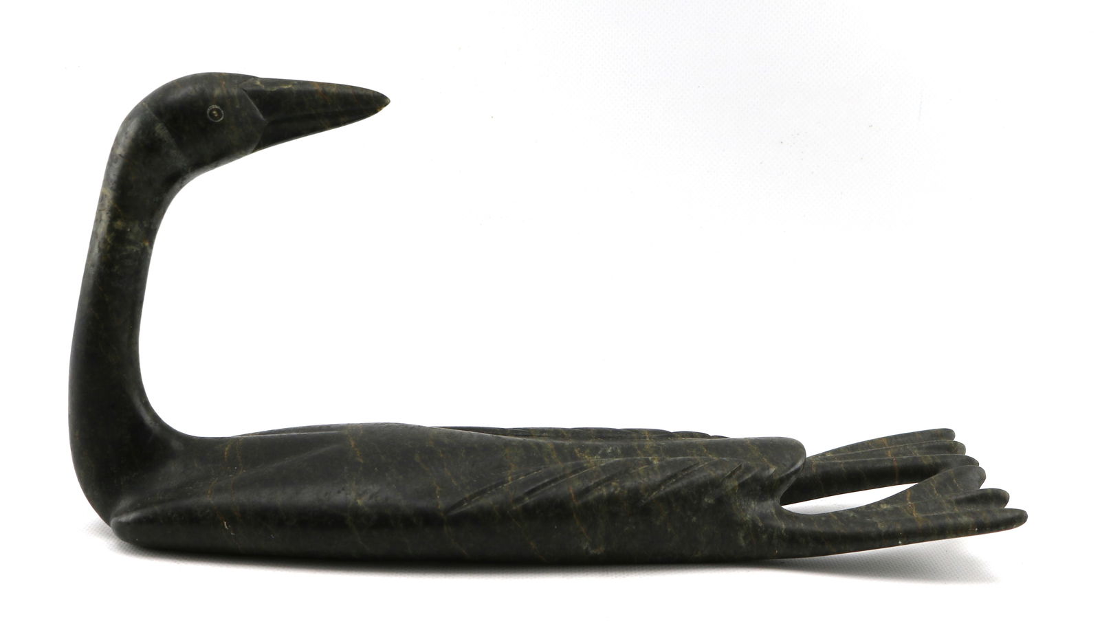 Osuitok Ipeelee Inuit Art Soapstone Loon Sculpture: Length appx. 13 inches by height appx. 6 3/4 inches, weight appx. 4 pounds. Provenance: Burdick Gallery, 1993 (accompanied by original receipt).