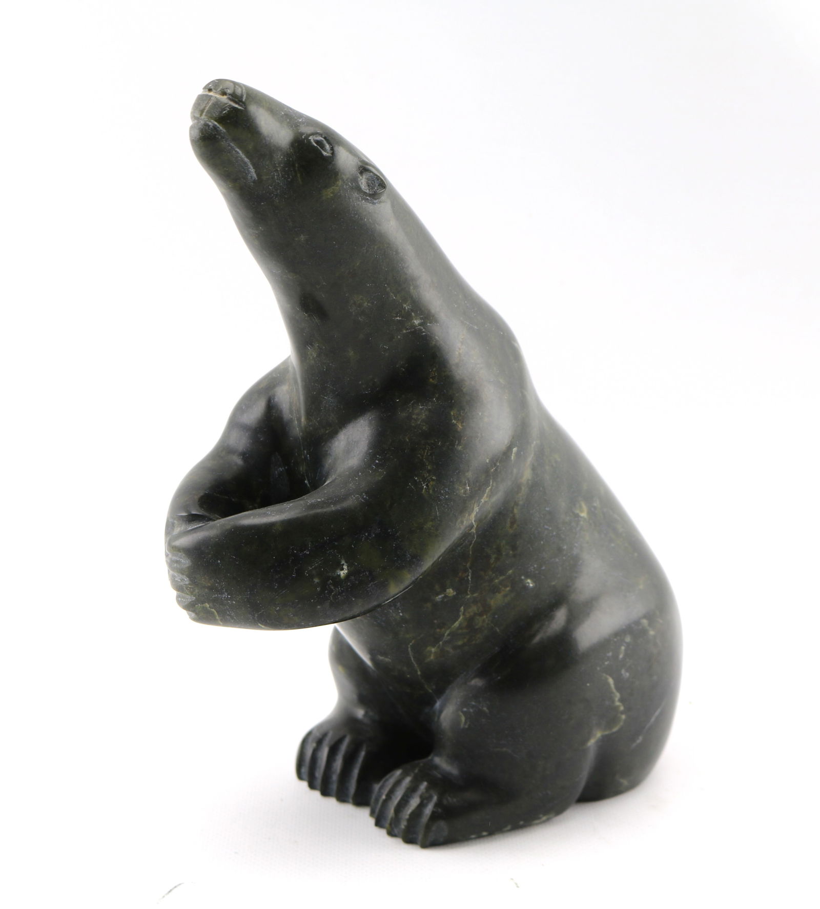 Charlie Ugyuk Inuit Art Soapstone Bear Sculpture: Height appx. 10 inches, weight appx. 11 pounds.