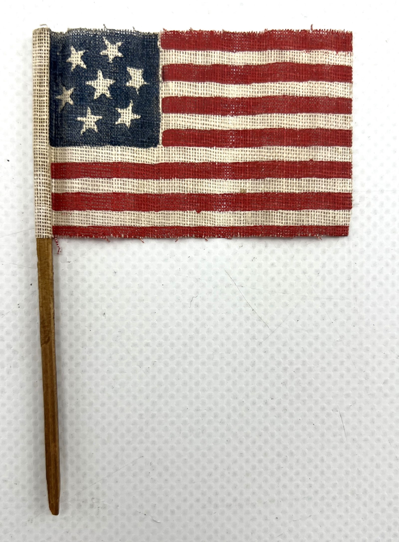 Confederate Civil War Seven Star Parade Flag, Circa 1861: Overall length of pole 4 inches. Good condition with minor fraying.