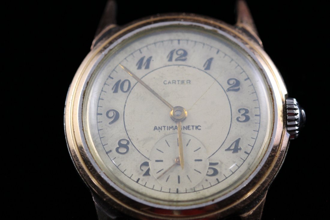 Movado Retailed by Cartier Mens Wristwatch: Movado Retailed by Cartier Mens Wristwatch in rose gold finish.