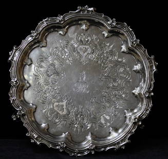 English Engraved Salver: English hallmarked engraved footed salver measuring 9.5" in diameter and a total weight of 15.3 ozt.