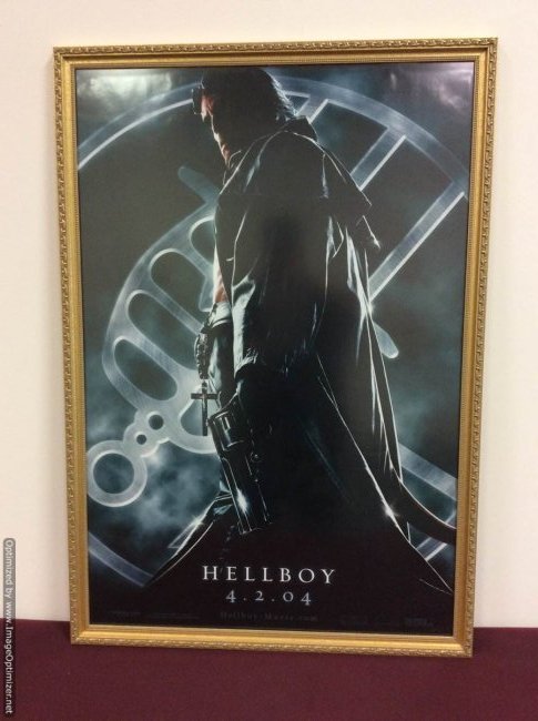 Hellboy Movie Poster with Licensed Reproduction Weapon: Hellboy Movie Poster in Custom Museum Mounted Frame with Protective Glass and Licensed Weapon 27 x 40