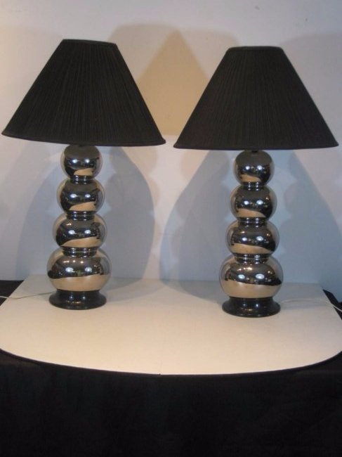 Robert Sonneman for Guy Kovacs Graduated Ball Lamps: This item is a Mid Century Robert Sonneman for Guy Kovacs chrome graduated ball lamps. The lamps measure approximately 32" tall.