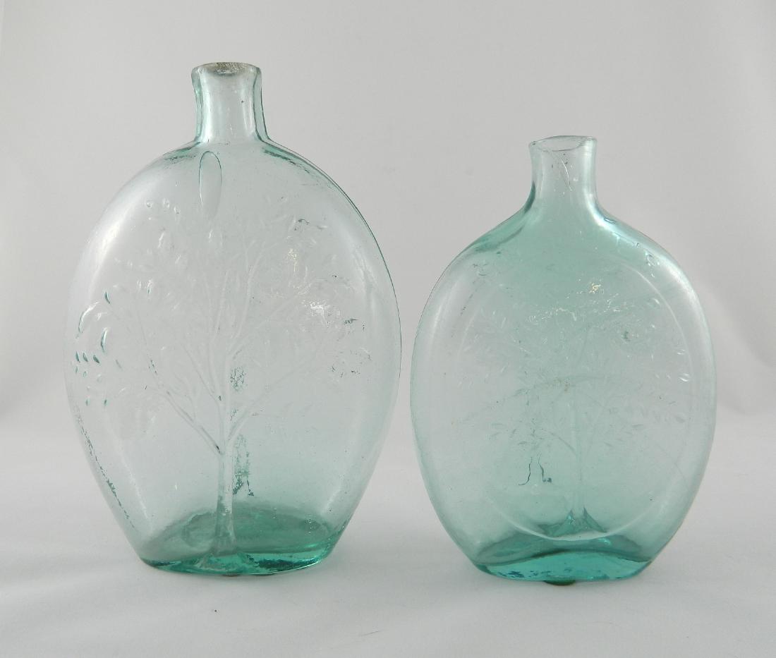 Flasks- 2 Aqua 'Summer': Flasks- 2 Aqua 'Summer'- 1.) 'Summer'- large tree in foliage with bird perched to right- 'Winter' bare tree with bird perched to left (both designs in panel), GX-15, pint, aqua; 2.) Summer tree with b