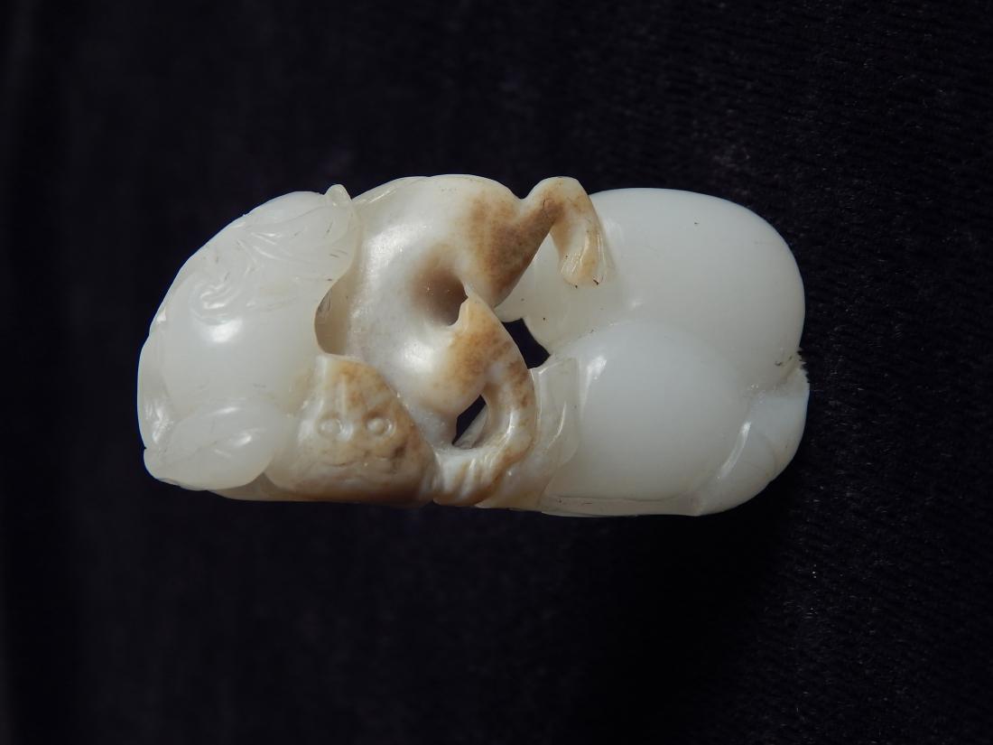 Carved jade pendant (1 of 6)