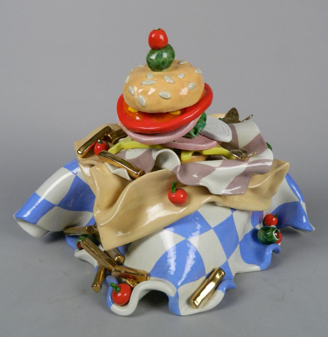 Gerri Palmer ceramic wall sculpture: Gerri Palmer (American 20th c.)- Burger and Fries- ceramic wall sculpture, some damage. 11 x 16 x 9''
