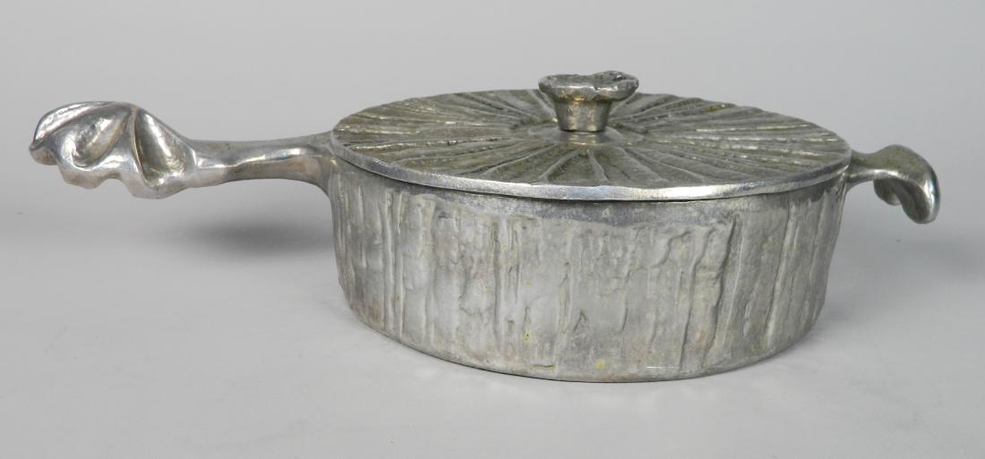 Don Drumm aluminum sclupture: Don Drumm (American 1935- )- Aluminum Sclupted Pan with Lid, signed on lid, on lid handle and on bottom of the pan with ''CA036'' imprinted as well, minor rusting, scratches on bottom of pan. 10''dia,