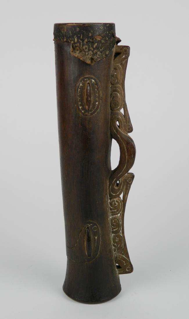 Mussim carved wood finger drum: Mussim carved wood finger drum with stylized bird handle and original tympanum. 12 1/4'' Provenance: Skinner auction, March 14, 2015, Lot 11.