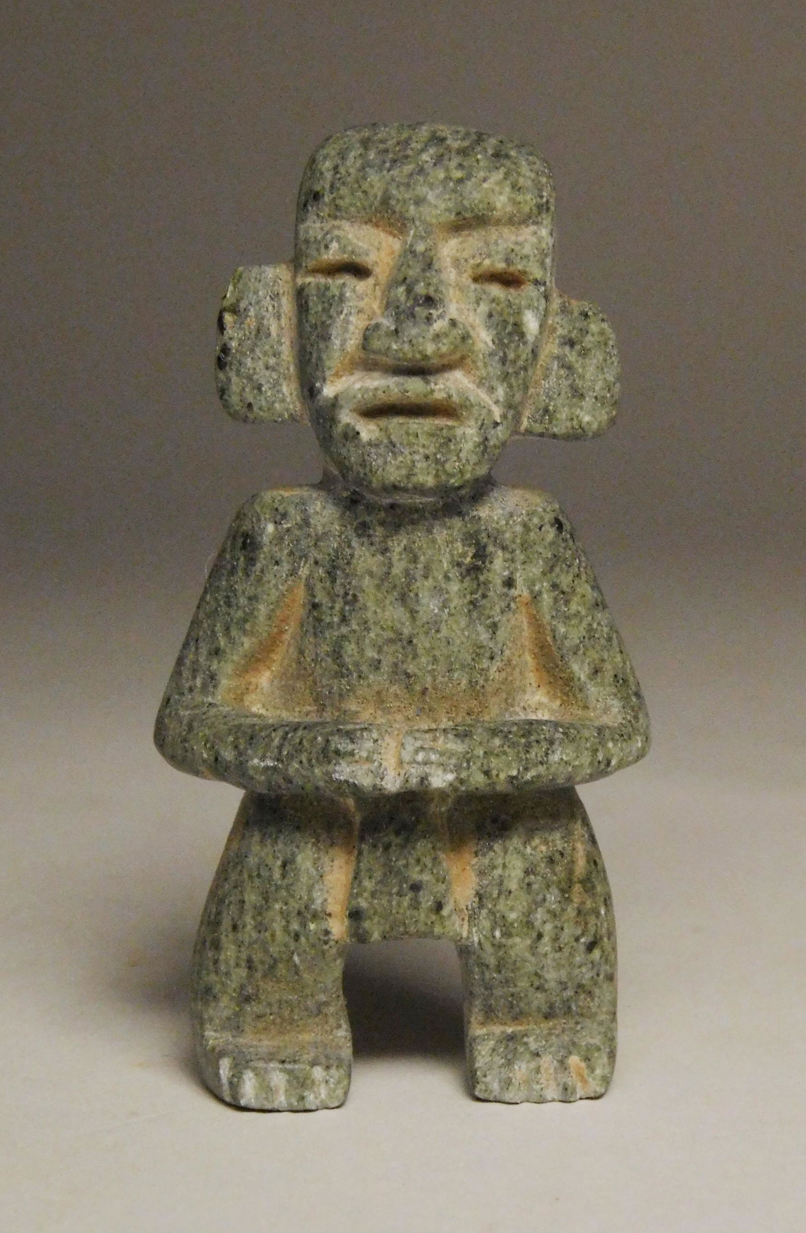 Carved stone Pre-Columbian figure (1 of 3)