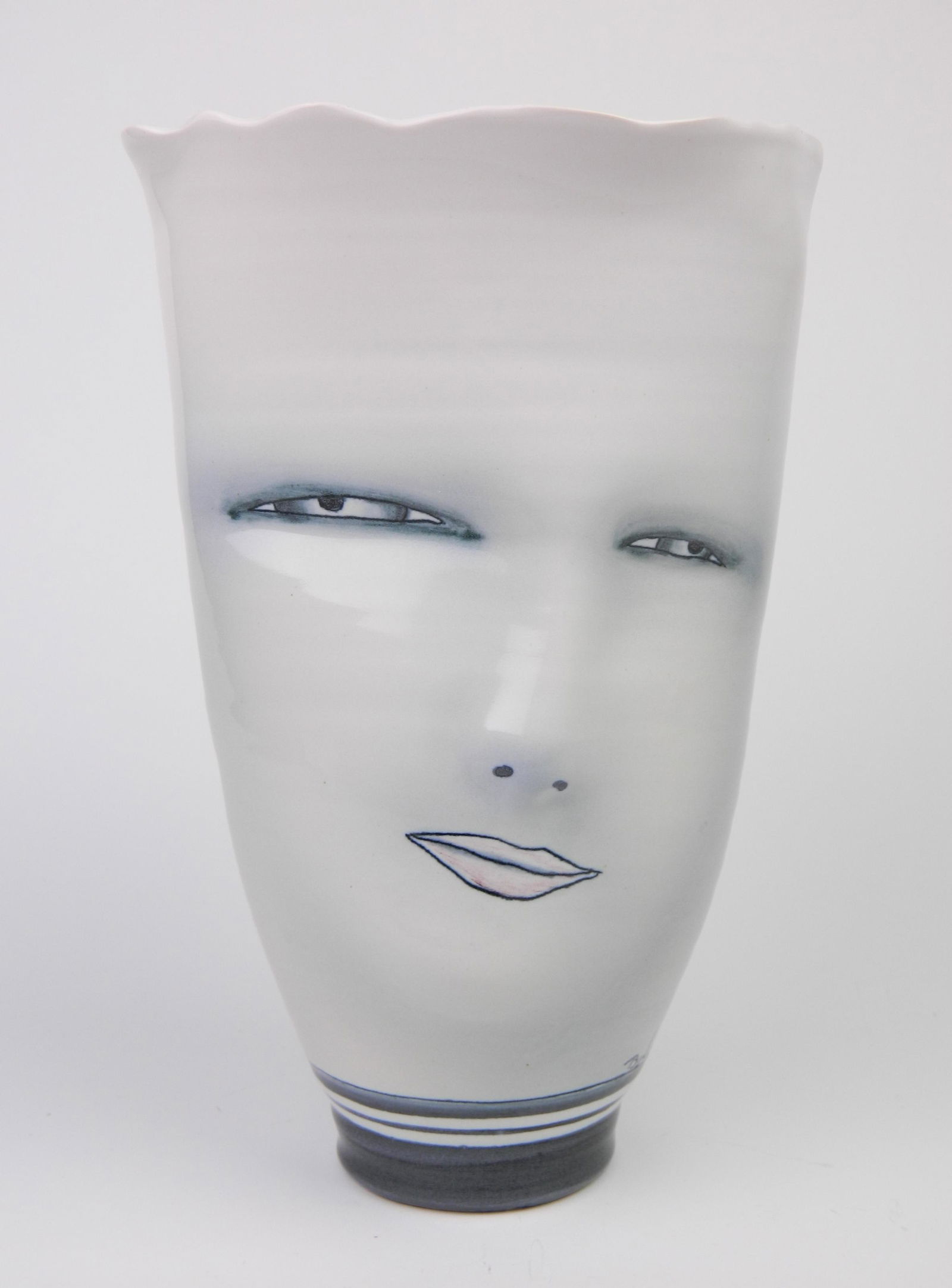 Bing Gleitsman porcelain vase: Bing Gleitsman porcelain vase, with 3 faces, 2002, signed Bing 2002 at bottom. 10 1/2''h