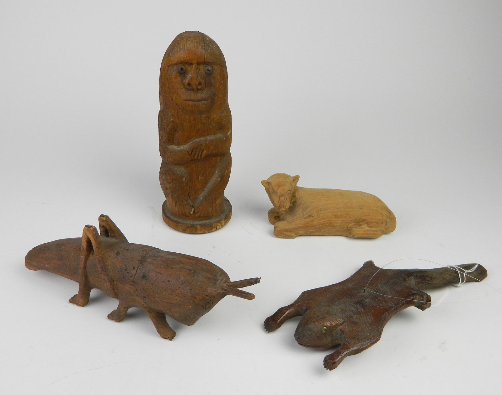 Lot of Silvio Zoratti works: Lot of works by Silvio Zoratti (Italian/American 1896-1992)- Seated Monkey, 1965, 9 1/4''h; Flying Squirrel, 11''l; Lamb, 1975, 3 5/8''; Cricket, 1975, 3 5/8''- 4 carved wood animals, 3 have stamped s