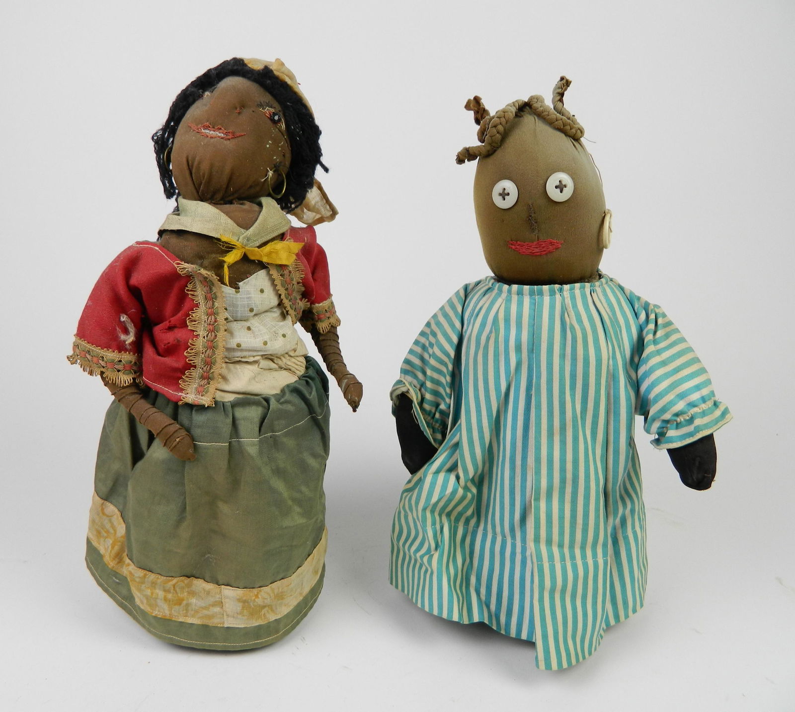 2 Bottle doll doorstops: 2 Bottle doll doorstops, fair condition. 15 5/8''h; 14''h