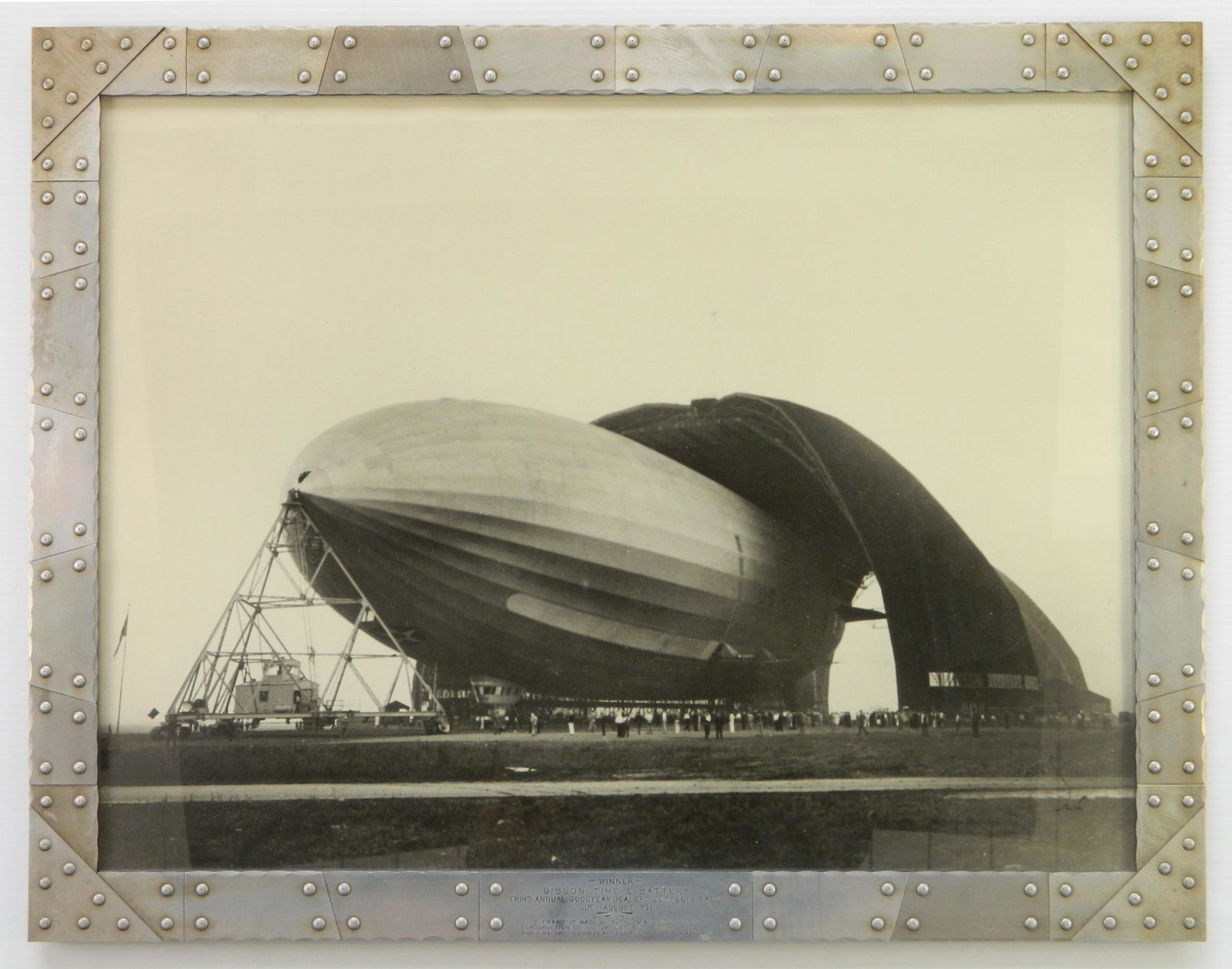 Margaret Bourke-White photograph: Margaret Bourke-White (American 1904-1967)- ''USS Akron''- silver gelatin photograph, signed Bourke-White in ink lower right , framed in duralumin, an aluminum alloy, with attached plaque inscribed: '
