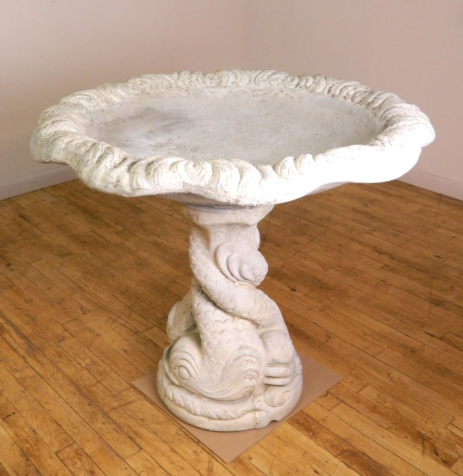 Concrete bird bath/ fountain: Cast concrete bird bath, 2 part, dolphin form base. 31''h 36'' dia.