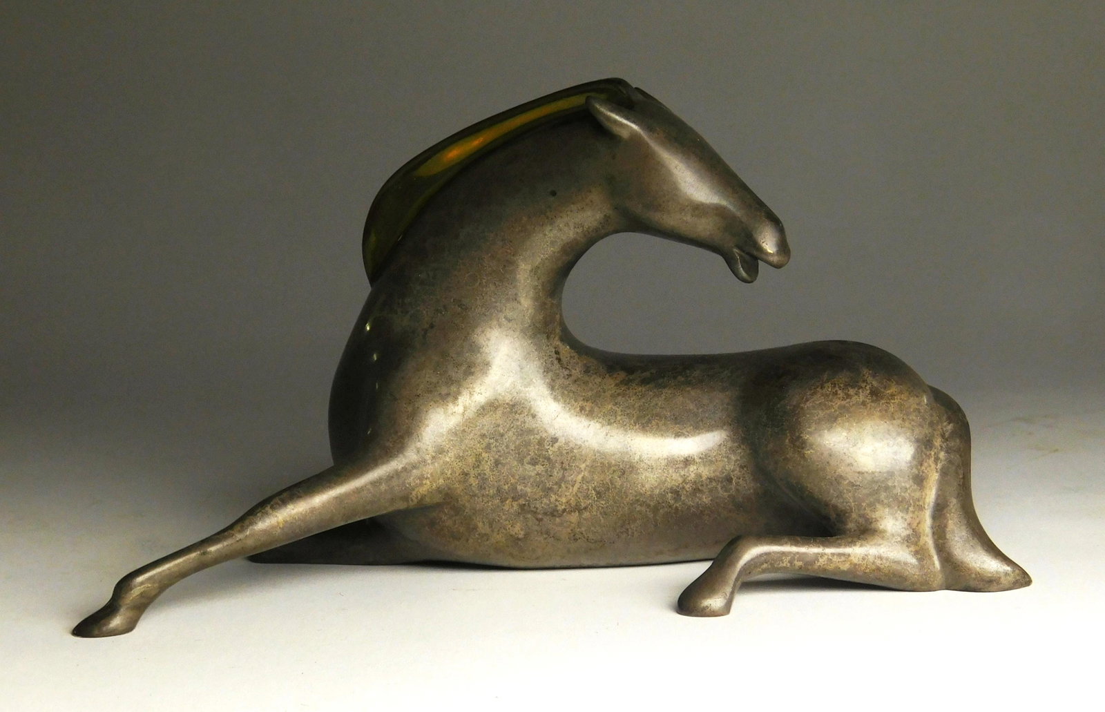 Loet Vanderveen metal sculpture: Loet Vanderveen (American 1921-2015)- Reclining Horse- metal sculpture, signed Loet and numbered 366/750. 4 1/4 x 8 x 2 1/4''