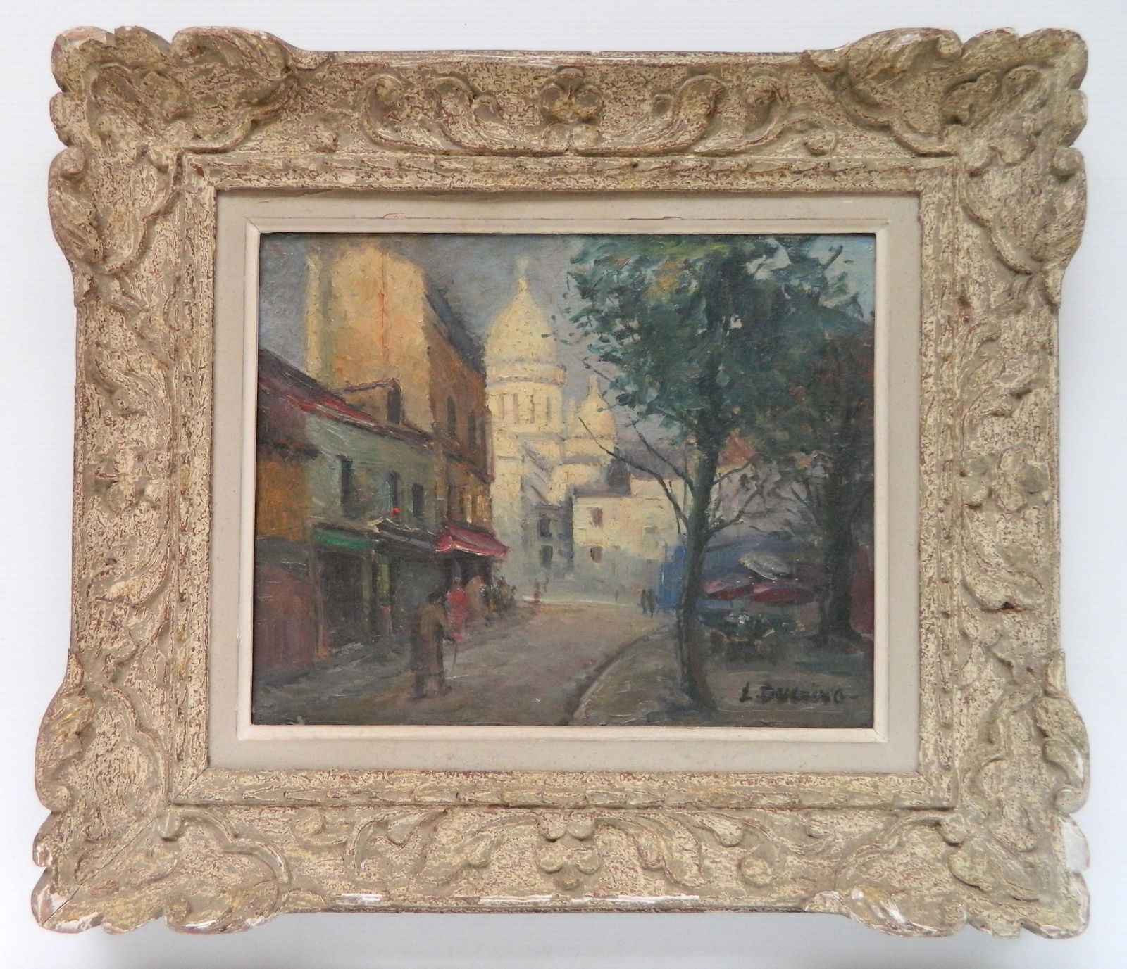 Lucien Ducuing oil: Lucien Ducuing (French 1896-1958)- French Street Scene- oil on masonite, signed L. Ducuing lower right, framed, surface grime. 13 x 18''