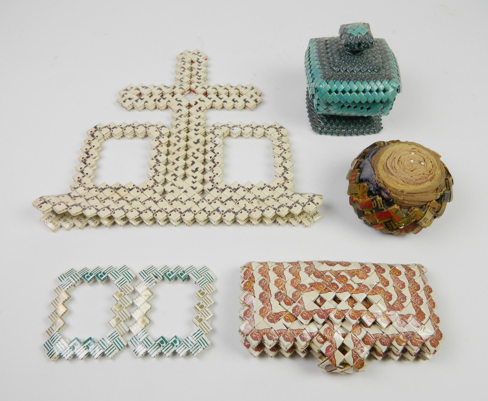 Folk art cigarette pack items: 5 American folk art woven cigarette pack wrapper items- frames, purse, pin cushion and box, good condition.