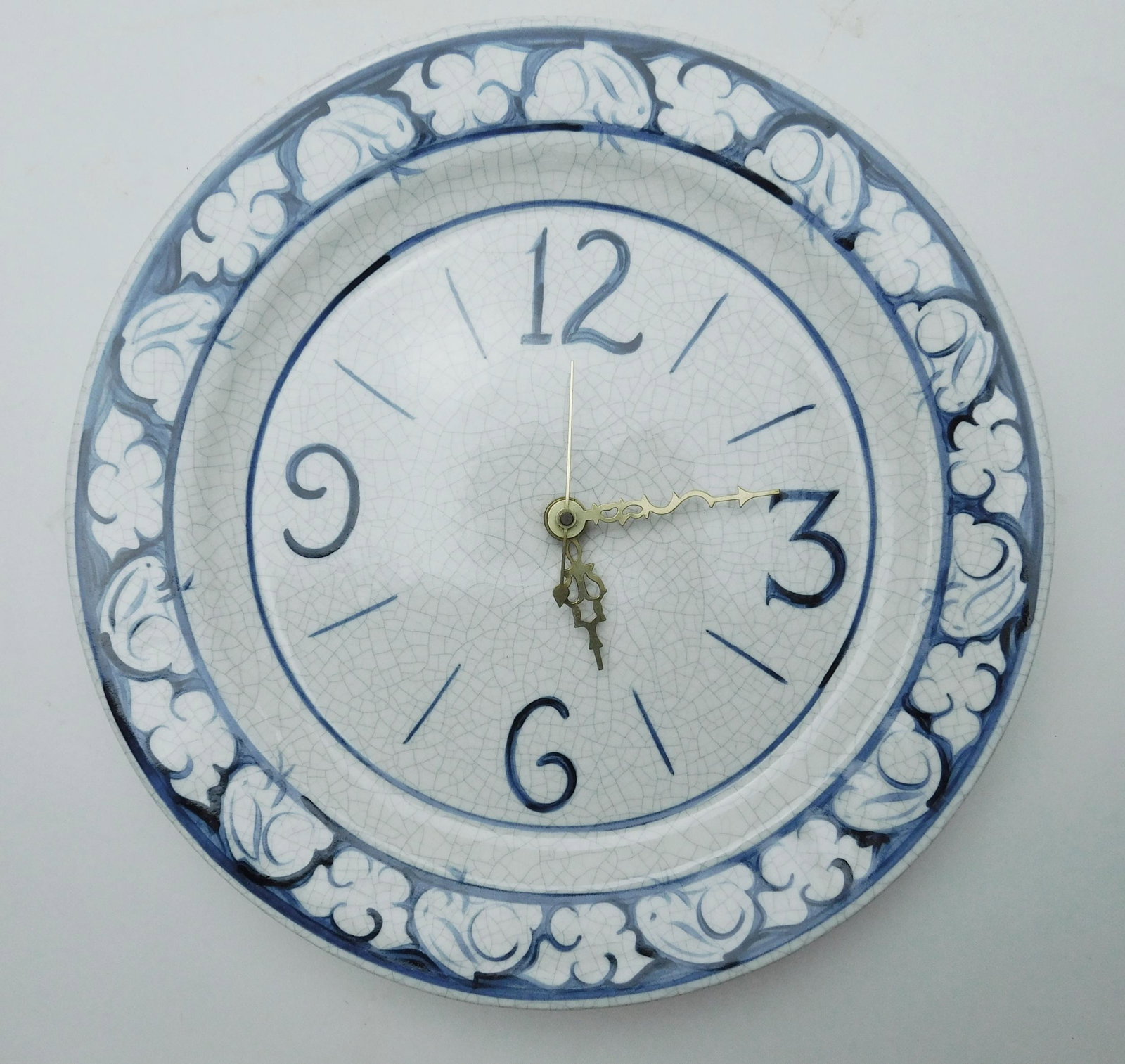 Dedham pottery potting shed wall clock: Dedham pottery potting shed wall clock, good condition. 11 1/4'' dia.