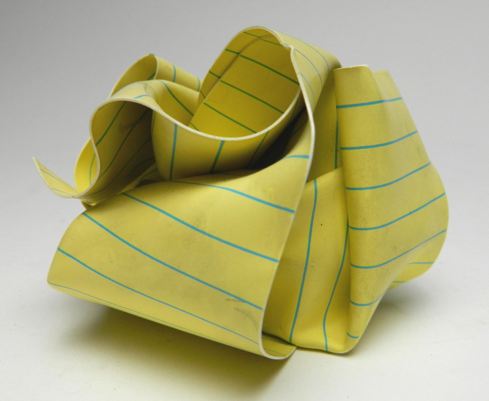 Tibor Kalman paperweight: Tibor Kalman (Hungarian/ American 1949-1999)- ''Legal-Size Paperweight''- vinyl and lead paperweight, 1984, marked on bottom. 3 3/8 x 3 1/2 x 4 1/2''
