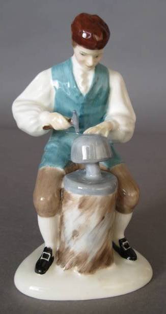 Royal Doulton Porcelain Figurine: Royal Doulton Porcelain Figurine- ''Silversmith of Williamsburg'' HN 2208, designed by Margaret Davies, issued 1960-1983, signed in blue marker on bottom- 'Michael Doulton 21 Oct. 1977', very good con