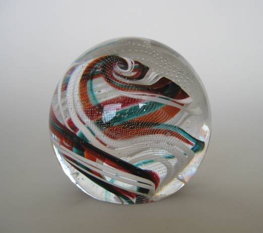 Harry Boyer glass paperweight: Harry Boyer glass paperweight, 1997, red, orange and turquoise swirl with controlled air bubble design, signed and dated, very good condition.