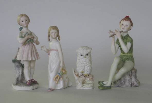 Group of cybis figures: Group of Cybis porcelain figurines including Peter Pan, Wendy, girl with flowers and an owl, all marked Cybis on bottom, very good condition, various sizes.