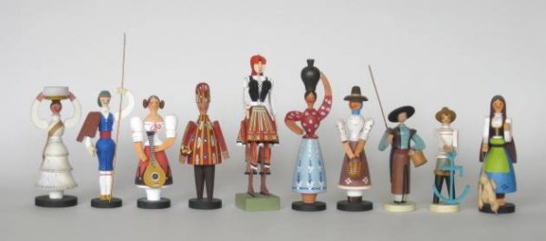 10 Portugal wooden figures: 10 Portugal figurines of men and women, made of wood and pigment, ca. 1940's, all marked except one, some wear otherwise good condition, various sizes.
