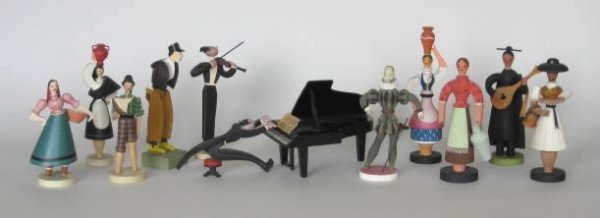 10 wooden Portugal figurines: 10 Portugal figurines of men and women, made of wood and pigment, ca. 1940's, all marked except one, together with a piano and piano player, some wear otherwise good condition, various sizes.