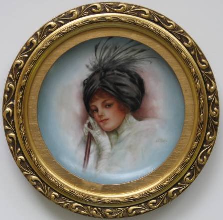 H. Litkovitz hand-painted porcelain plaque: A hand-painted porcelain plaque by Helen Litkovitz, Portrait of A Woman in A Black Bonnet, in circular form, framed, signed lower right, very good condition. 8 11/16''dia