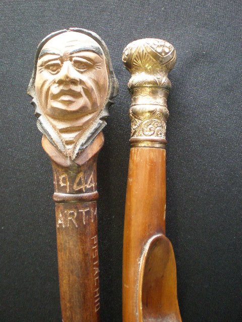 Vintage cane- Dartmouth: Vintage cane- Dartmouth 1944 with man's head carved at top and several names carved into sides, with a second carved cane in maple with brass top.