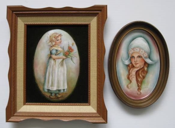 H. Litkovitz two hand-painted porcelain plaques: Two hand-painted porcelain plaques by Helen Litkovitz, Young Dutch Girls, signed lower right, oval forms, framed, very good condition. 8 1/2 x 5 1/4'', 8 5/8 x 5 5/8''