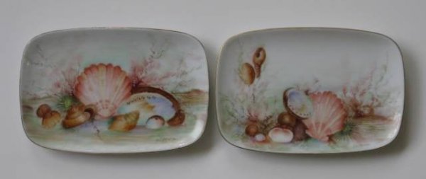 H. Litkovitz two hand-painted porcelain trays: Two hand-painted porcelain trays by Helen Litkovitz, Underwater Scenes with Shells, both signed on front, rectangular forms, applied gold edge, very good condition. 4 3/4 x 7 1/4'' 12.1 x 18.4cm