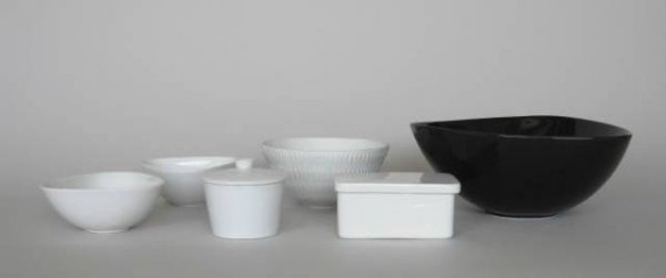 Arabia of Finland serving items: 8 Arabia of Finland serving pieces, ca. 1950's, bowls and containers together with a Kera Workshop; ceramic bowl, marked, all in very good condition, various sizes.