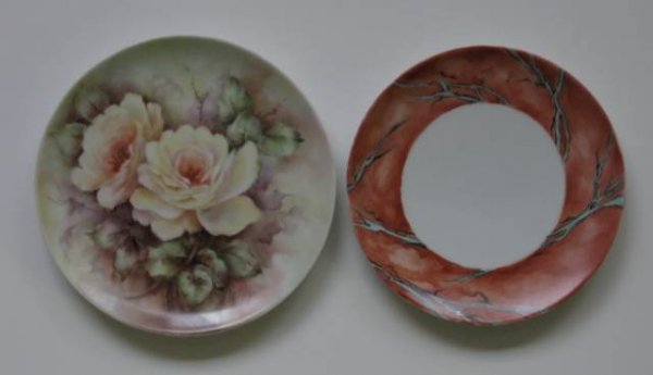 Two hand-painted porcelain plates: Two hand-painted porcelain plates- 1 by Helen Litkovitz, decorated with yellow flowers, signed; 1 decorated with a branch design and a wide peach border, marked 'Bavaria, Schumann, Arzberg Germany' on