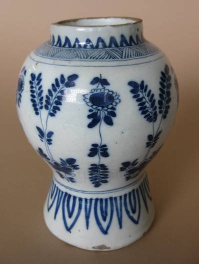 18th c. Dutch Delft blue and white vase: 18th c. Dutch Delft blue and white vase- wheat and floral design, marked on bottom, minor chipping. 6 1/2''h