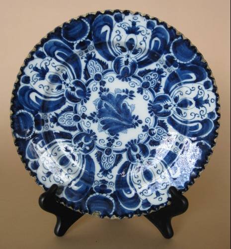 18th c. Dutch delft plate: 18thc. Dutch delft blue and white plate by Jan van den Briel, marked on bottom, rim chips. 10'' dia.