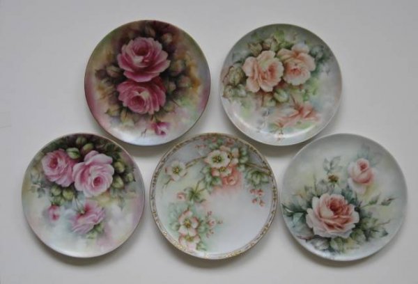 5 hand-painted plates by Helen Litkovitz: 5 hand-painted plates by Helen Litkovitz- 4 decorated with roses, the other with apple blossoms, all signed and in good condition, various sizes.