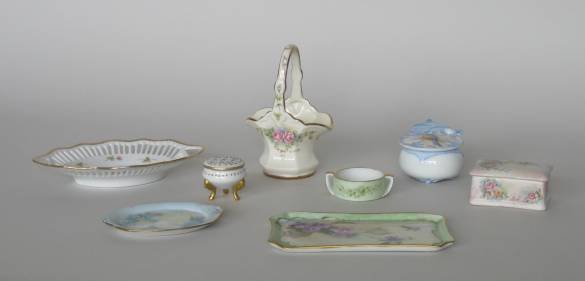 8 H. Litkovitz hand-painted porcelain items: 8 hand-painted porcelain items by Helen Litkovitz- 4 small trays, 1 small basket and 3 covered boxes, various sizes.
