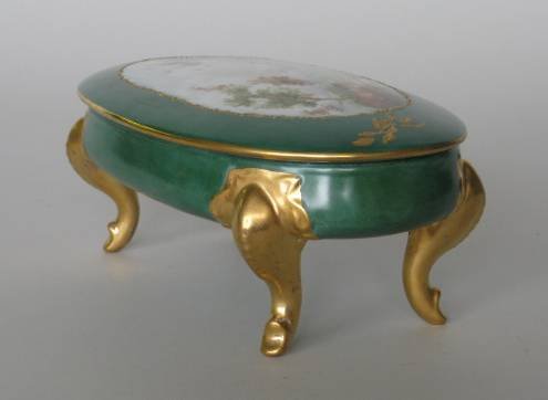 H. Litkovitz hand-painted porcelain container: Hand-painted porcelain footed oval container with lid by Helen Litkovitz, depicting A Farm Scene in center, on dark green ground with gilt, signed on lid in scene at lower right, good condition. 7 7/8