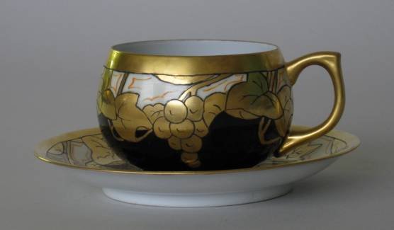 Hand-painted porcelain cup & saucer