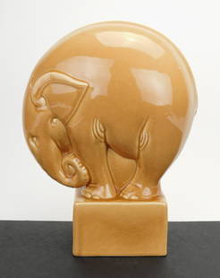 Large Cowan elephant paperweight.: Large Cowan pottery studio paperweight- ''Elephant''- ceramic paperweight, designed by Margaret Postgate (American 1879-1953), covered with a caramel glaze, impressed Cowan mark on bottom, very good c