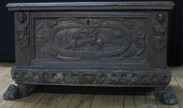 Walnut Spanish chest: Walnut Spanish chest, ca. 1840's- lift top, central medallion of warrior battling a serpent, caryatid supports, carved hoof feet, note: condition. 23 x 15 1/2 x 35''