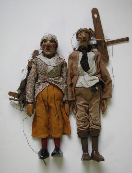 Male and female marionettes: 20th c. Male and female marionettes, some wear, scartches, nicks and cracks, fair condition. 23''l, 25''l