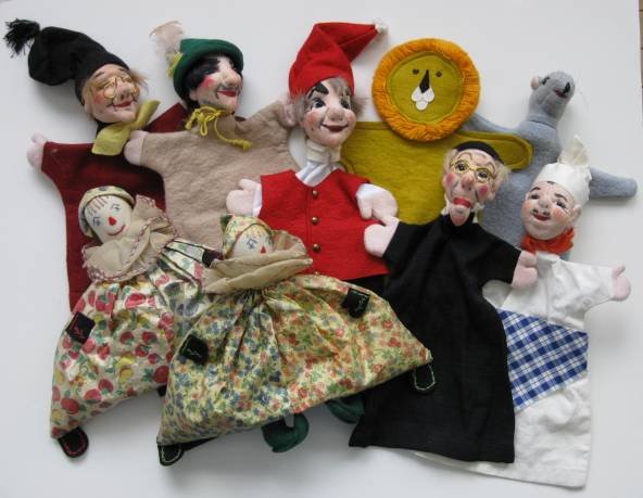 7 German hand puppets: 7 Early 20th c. German hand puppets, along with 2 Canadian hand puppets and 2 American clown bean bags, fair condition. various sizes